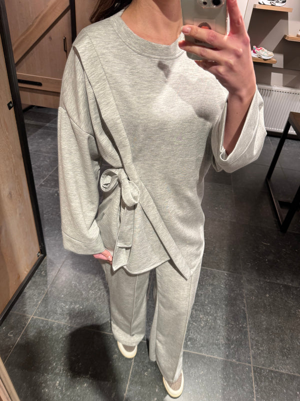 Knoop pak grijs